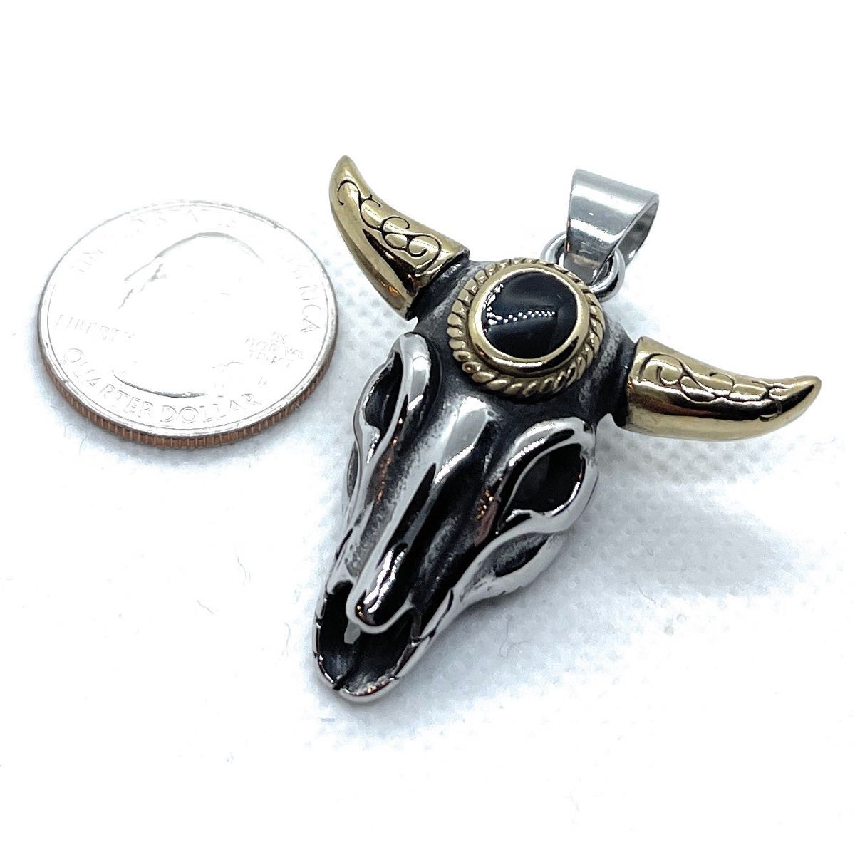 Make a statement with our exclusive skull pendant with gold horns; Add edge to your look! #skulljewelry