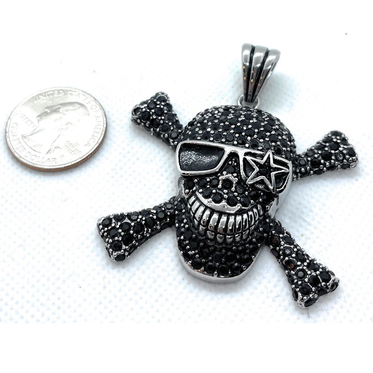 'Rock n' Rolla' Skull Pendant - szie comparison next to a us quarter