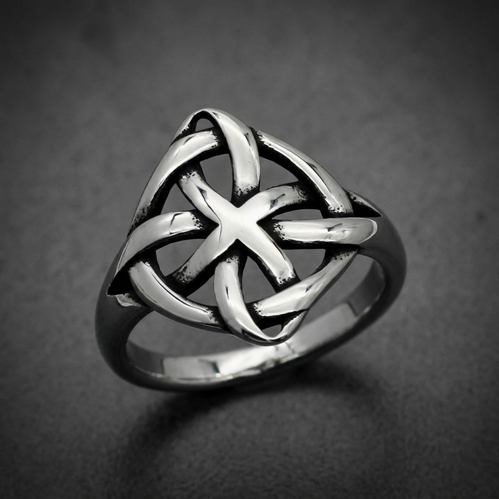 Anvil Knot Ring in 316L stainless steel with a polished silver finish. Features an intricate Celtic knot design with a central cross pattern.