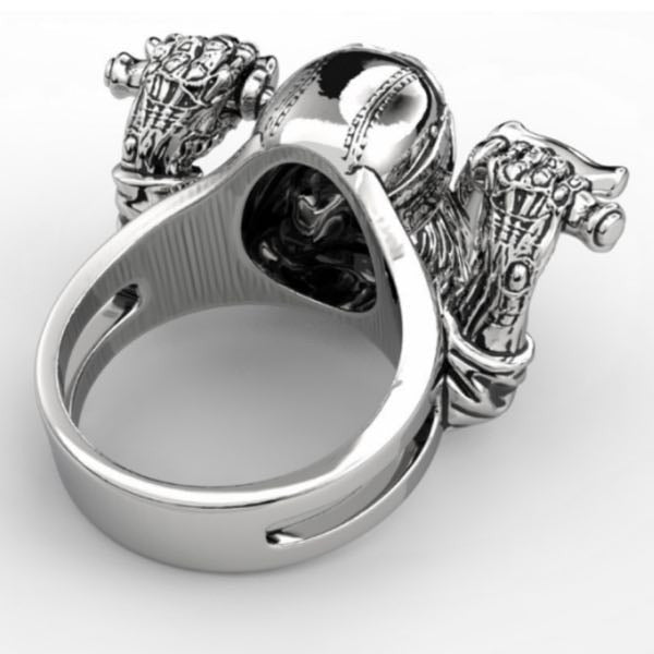 bearded biker skull ring riding a harley davidson motorcycle