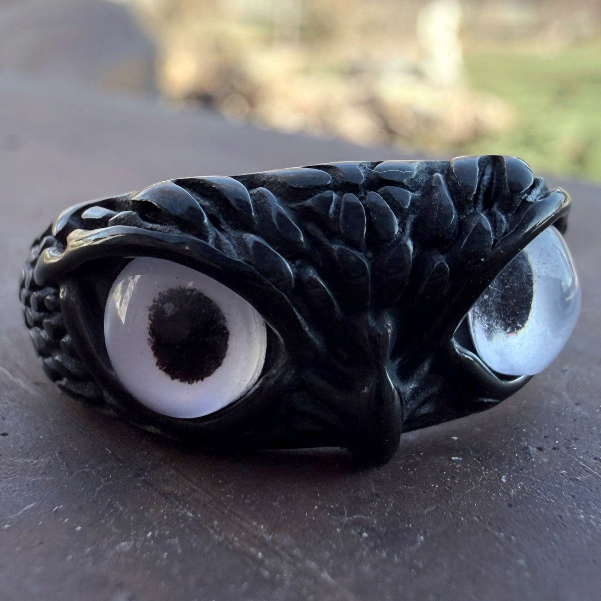 Dark owl ring in stainless steel with detailed eyes and rugged construction