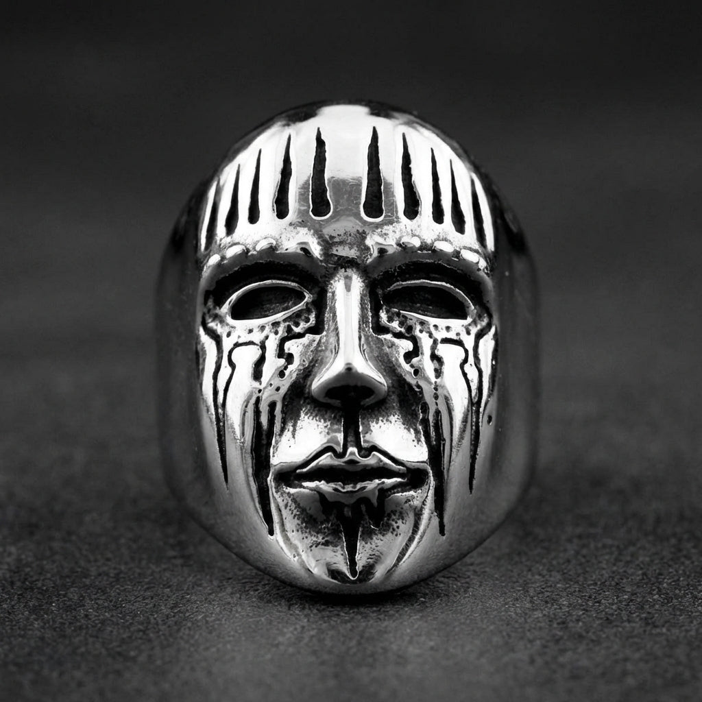 GRIMMWACHT™ Remnant I DEATHMASK LEGION™ Ring made of 316L stainless steel, featuring a melted, crying skull face design with jagged crown-like top.