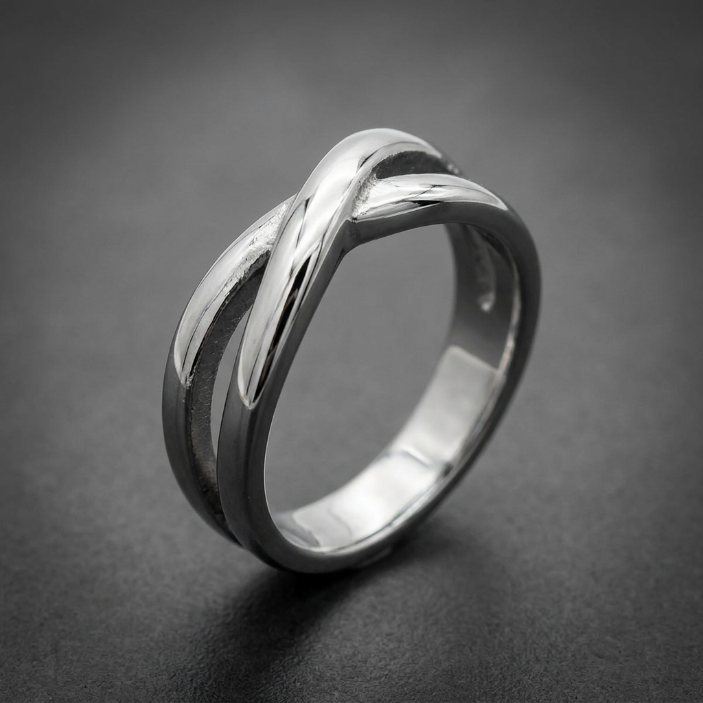 Polished silver 316L stainless steel X-band ring with a smooth, intertwining design and a high-shine finish.