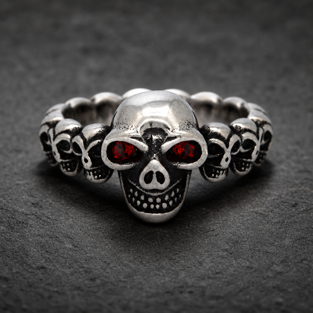 A close-up of the Dark Skull Legion Ring with glowing red eyes, crafted from 316L stainless steel, against a dark, dramatic background.