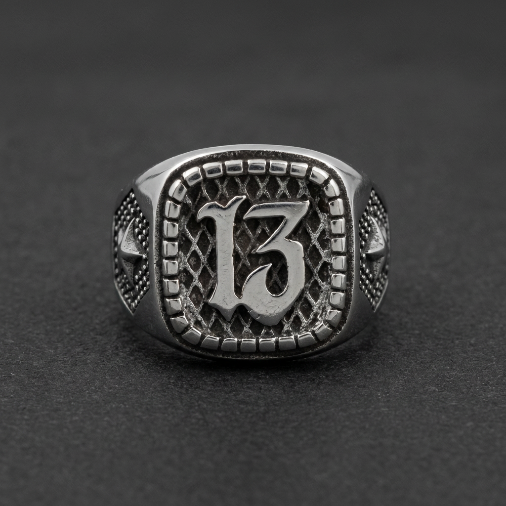 Stainless steel ring with number 13 emblem and detailed design, silver color