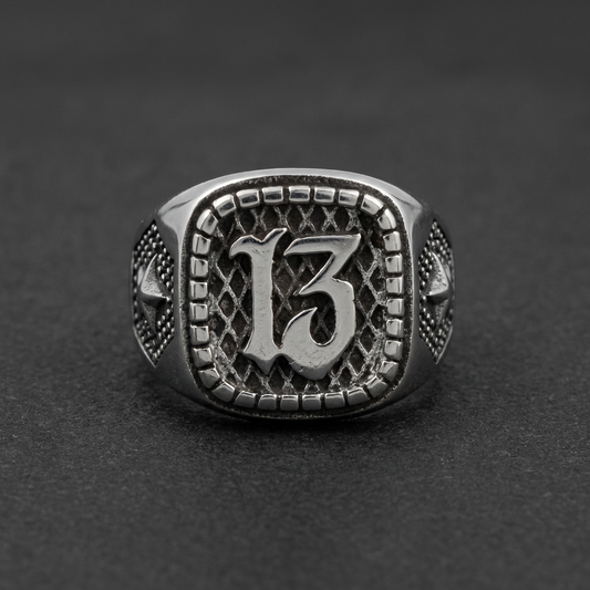 Stainless steel ring with number 13 emblem and detailed design, silver color