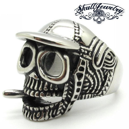 skull ring wearing a cap baseball and vaping