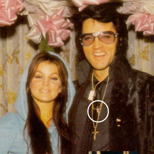 Elvis Presley wearing TCB pendant