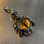 Ciondolo Occhio di Drago Giallo - Skeleton Holding Yellow Dragon Eye Pendant (#p118yellow)