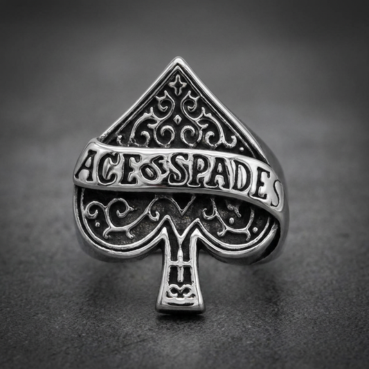 Bold Ace of Spades ring in 316L stainless steel with intricate filigree and text band.