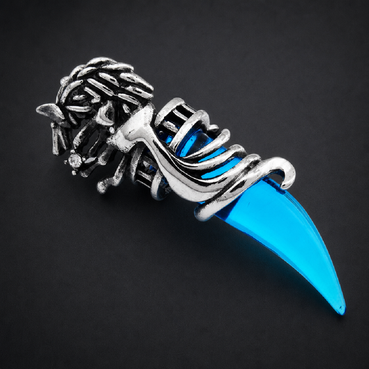 Fenrir's Fang Blue Wolfs Tooth Pendant. 316L surgical stainless steel wolf head gripping a sharp, vibrant blue resin fang. Detailed, edgy design.