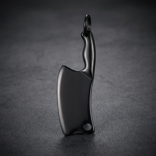 Dark matte 316L stainless steel meat cleaver pendant, heavy and bold, with a sturdy bail ring.
