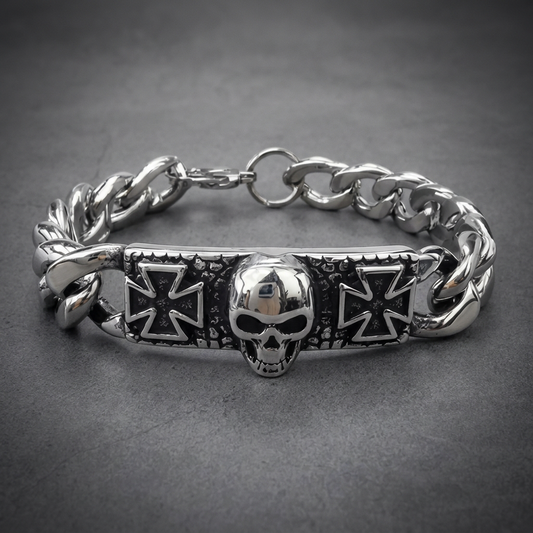 Silver 316L stainless steel curb link bracelet with a polished skull and dark Maltese crosses on a central rectangular plate.