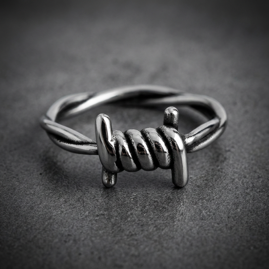 Iron Barbed Ring made of 316L stainless steel, featuring twisted barbed wire design and sharp textured barbs
