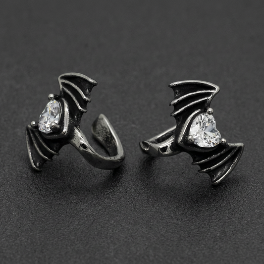 Bat Wing Zircon Lip Clip with clear white zircon stone, crafted from polished 316L stainless steel, designed as a gothic lip piercing.
