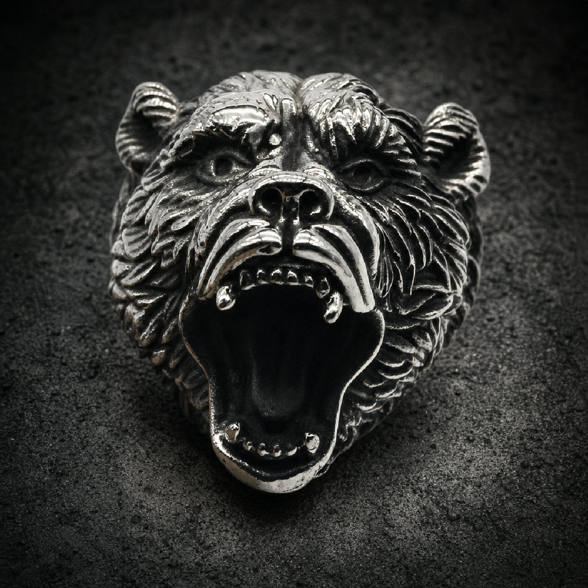 Heavy 316L stainless steel ring sculpted as an aggressive roaring grizzly bear with antiqued fur detailing.