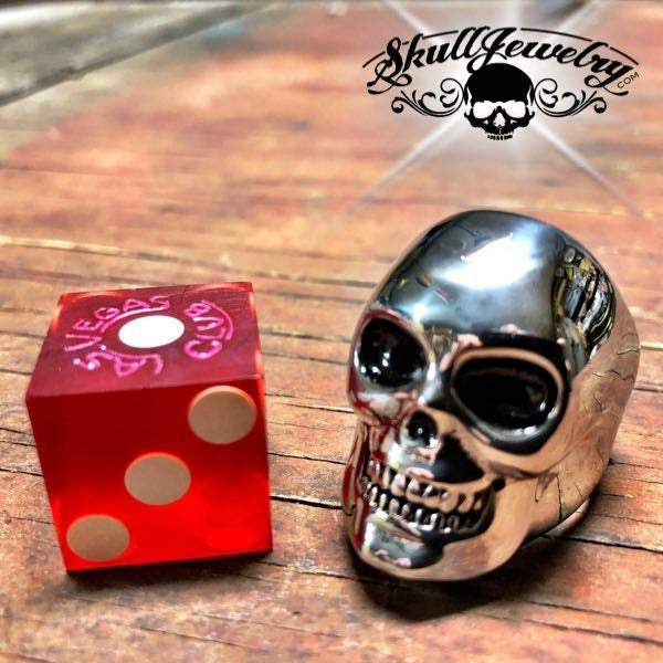 big BUFF solid skull ring - 132 next to a las vegas dice