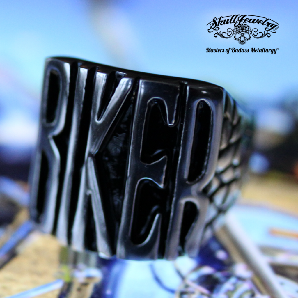 badass biker stainless steel ring sitting on a sturgis harley davidson motorcycle