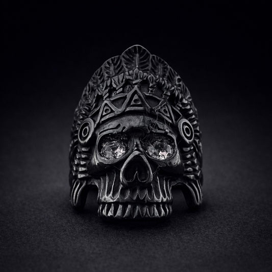 Black skull ring for men with detailed headdress and reflective eyes
