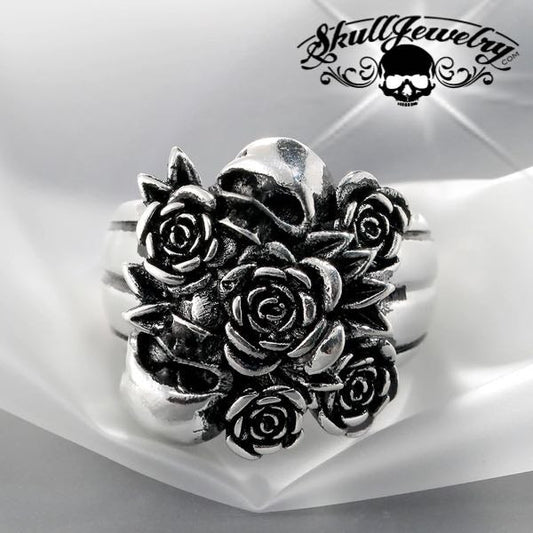 bundle of roses with two skulls ring