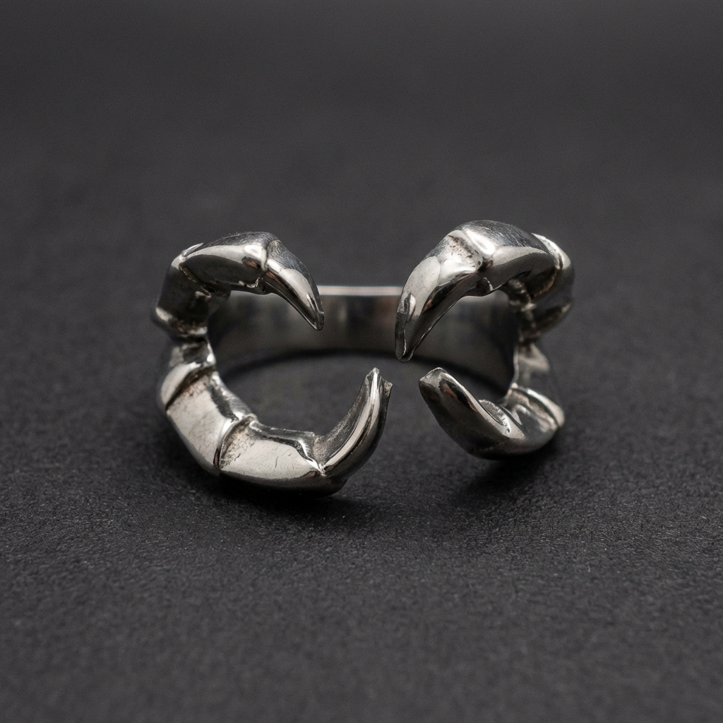 Claw Embrace Ring, featuring polished 316L stainless steel raptor talons aggressively embracing the finger, in a punk, HardKnocker™ style.