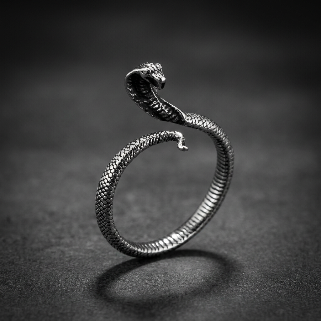 Shadow Cobra Coil Ring 316L stainless steel, a dark coiled cobra ring on a finger, featuring intricate scales and an oxidized finish.