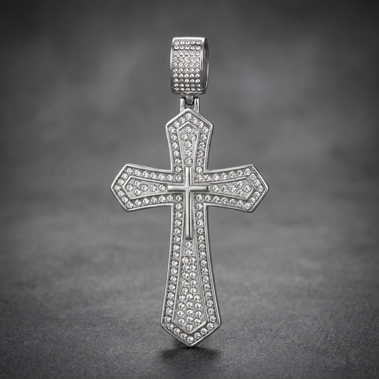 Heavy 316L stainless steel cross pendant with pave-set clear crystals, featuring an angled, faceted design and a matching studded bail.