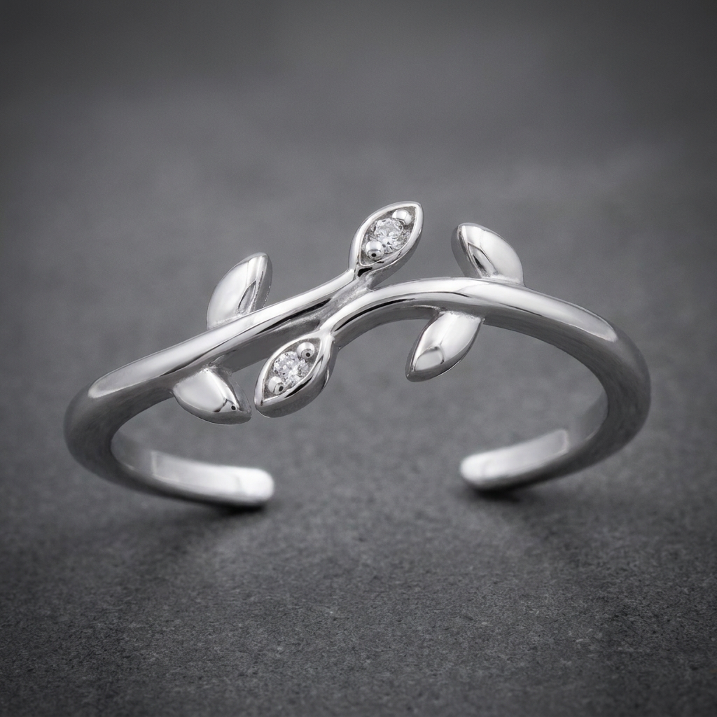 A .925 Sterling Silver - Crested Leaf Ring with clear stone details, crafted from high-polish 316L surgical-grade stainless steel shown on a dark background.
