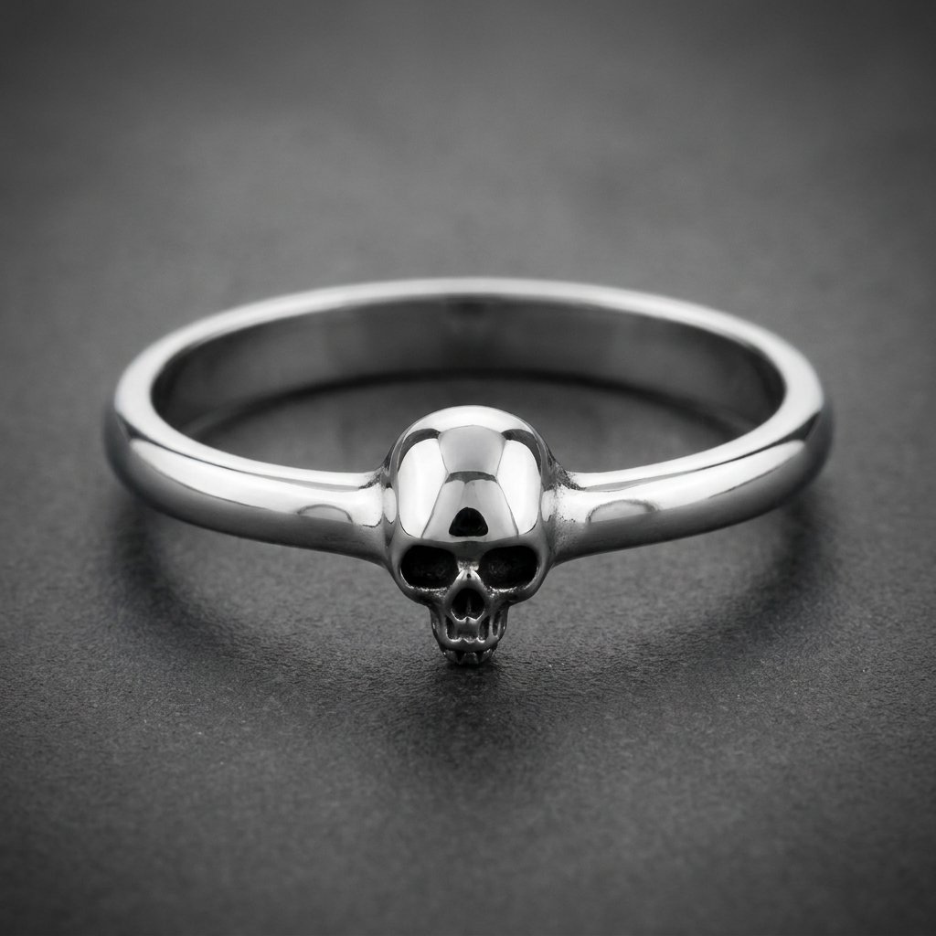 Minimalist Skull Ring in 316L stainless steel with a polished finish and HardKnocker construction, featuring a small, detailed skull centered on a smooth band.