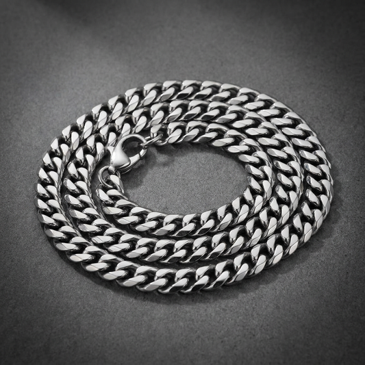 Dusk Curb 20 inch chain, a sturdy stainless steel necklace with classic curb link design, shown against a dark, atmospheric background.