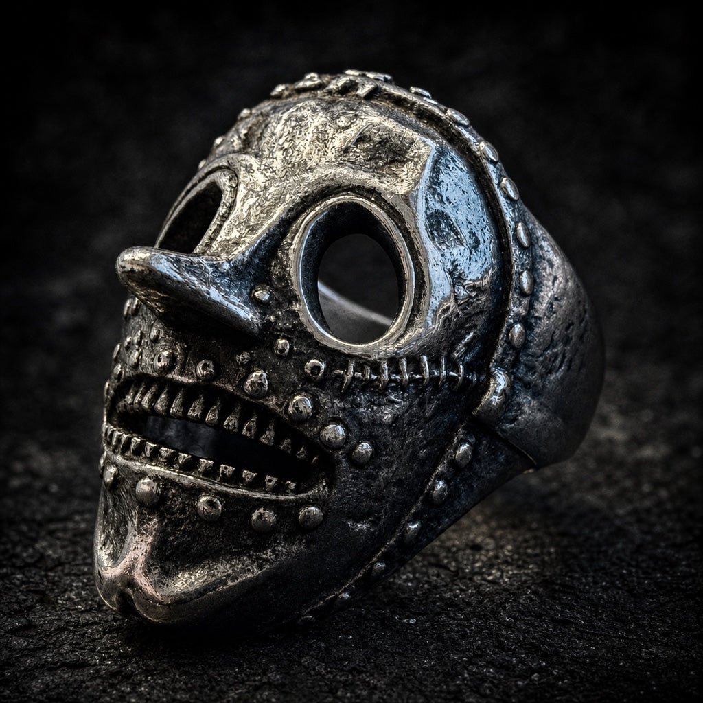 The Iron Horrorspike skull ring with studded rivets and bared teeth, 316L stainless steel, Deathmask Legion mask 3 of 8