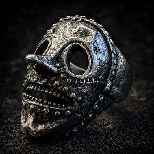 The Iron Horrorspike skull ring with studded rivets and bared teeth, 316L stainless steel, Deathmask Legion mask 3 of 8
