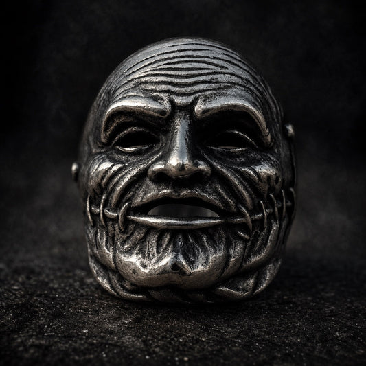 The Ragestaged Elderbane skull ring with weathered elder face, 316L stainless steel, Deathmask Legion mask 7 of 8