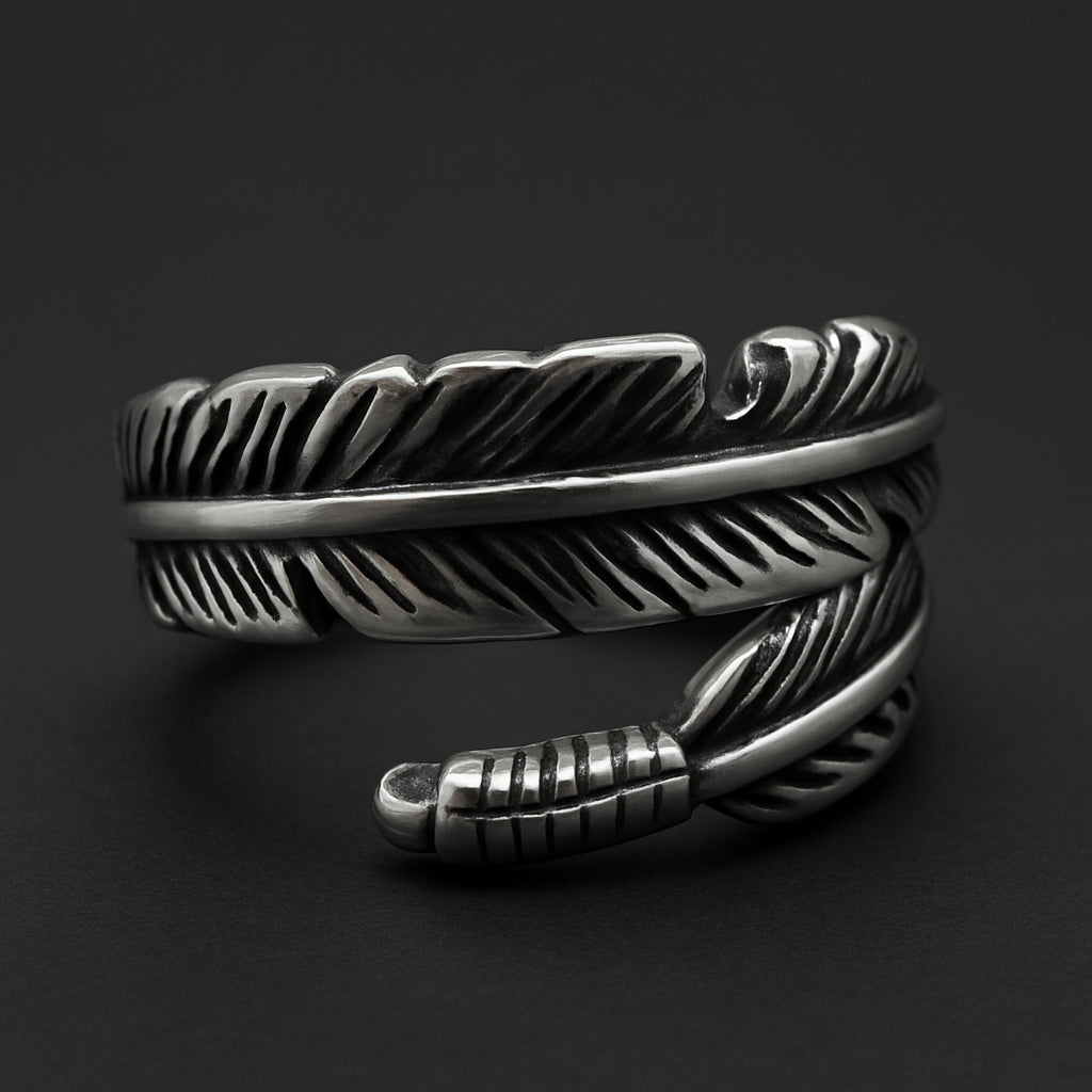 Winged Embrace Band stainless steel ring with intricate wing design for expressive style