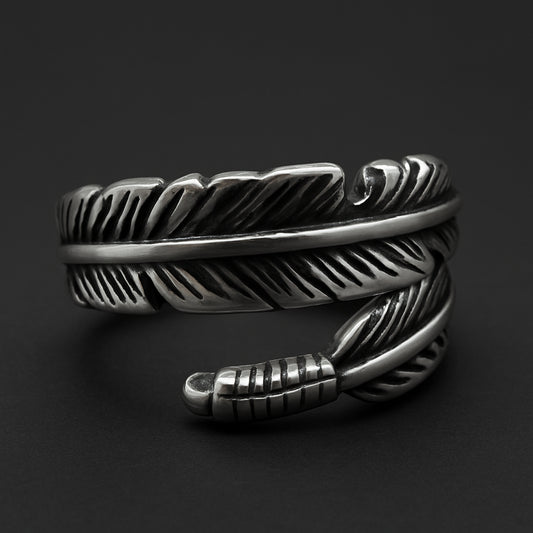 Winged Embrace Band stainless steel ring with intricate wing design for expressive style