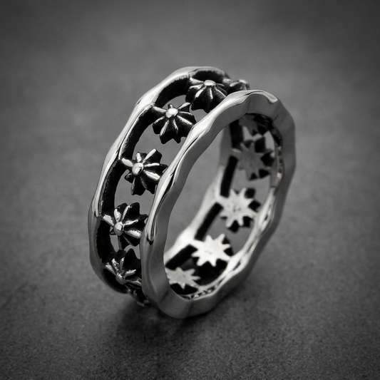 Unisex HardKnocker™ ring in 316L stainless steel with etched starburst design and rugged hammered edges.