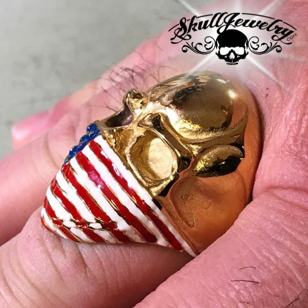 gold american infidel skull ring with painted red white and blue usa flag