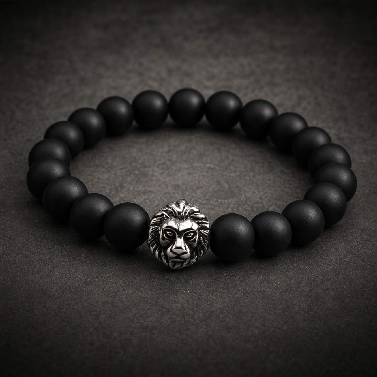 Primal Lion Bracelet with detailed 316L stainless steel lion head and black matte beads, showcasing raw power and untamed spirit.
