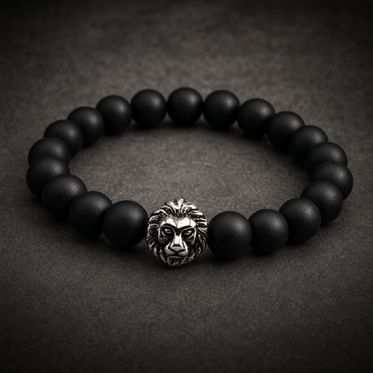 Primal Lion Bracelet with detailed 316L stainless steel lion head and black matte beads, showcasing raw power and untamed spirit.
