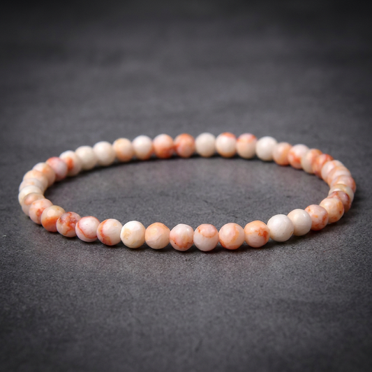 Marbled Bead Bracelet in 316L stainless steel, featuring 4mm round beads with white and orange vein patterns.