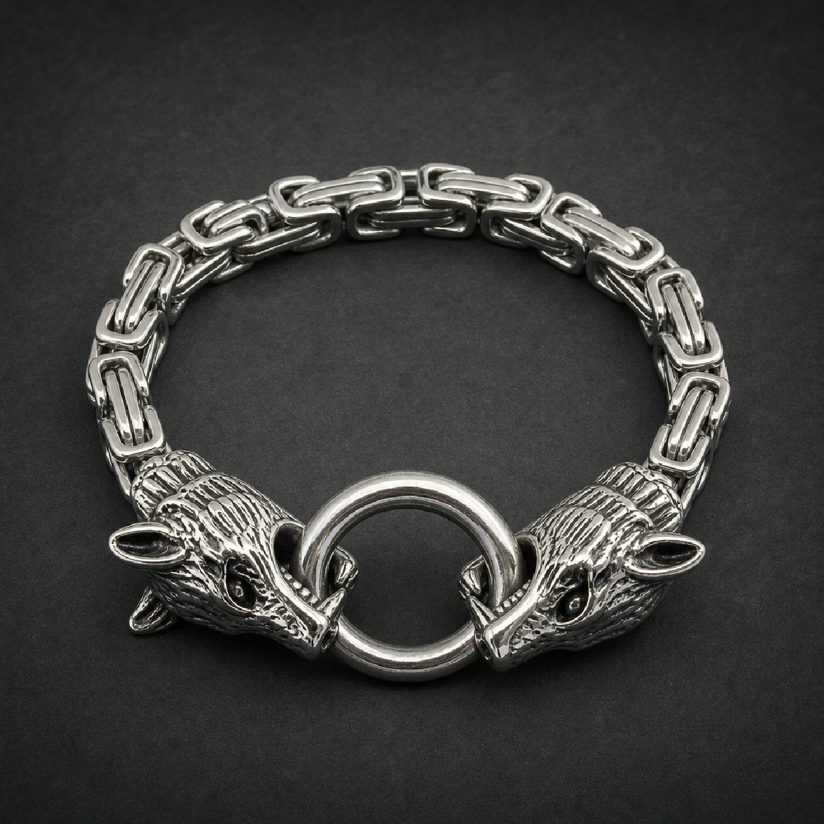 Heavy 316L surgical stainless steel wolf head bracelet with Byzantine chain and polished silver finish.