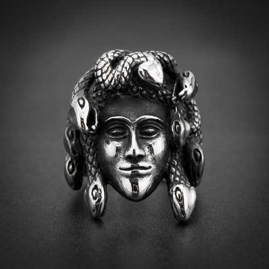Heavy 316L stainless steel Medusa head ring with detailed snakes and oxidized finish.