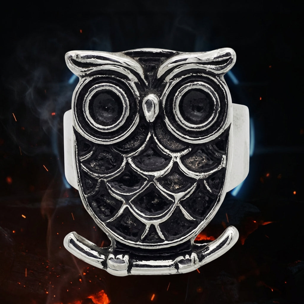 Unisex owl motif ring in 316L surgical stainless steel with silver oxidized gothic style details and textured metal.