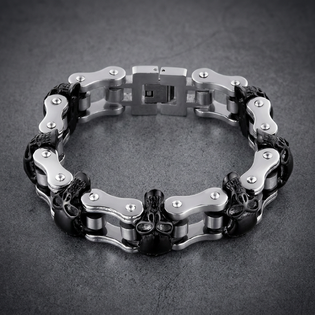Heavy 316L stainless steel motorcycle chain bracelet with three black skull beads and polished silver links.