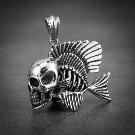 A heavy, detailed Skullfish pendant made of polished 316L surgical stainless steel, featuring a prominent human skull fused with a fish skeleton, including an articulated fin and tail, held by a thick bail.