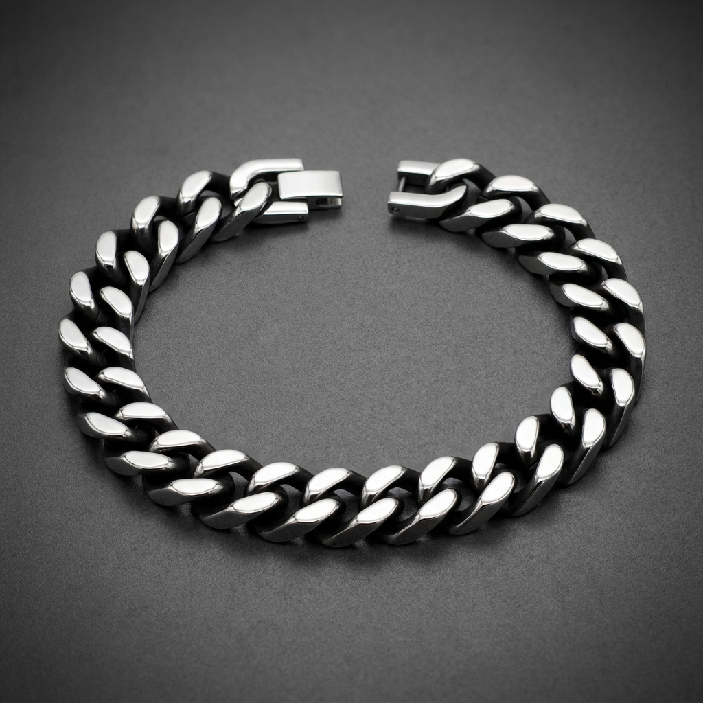 Heavy-duty 316L stainless steel curb link bracelet with dark oxidized recesses and bright polished surfaces, featuring a sturdy box clasp.