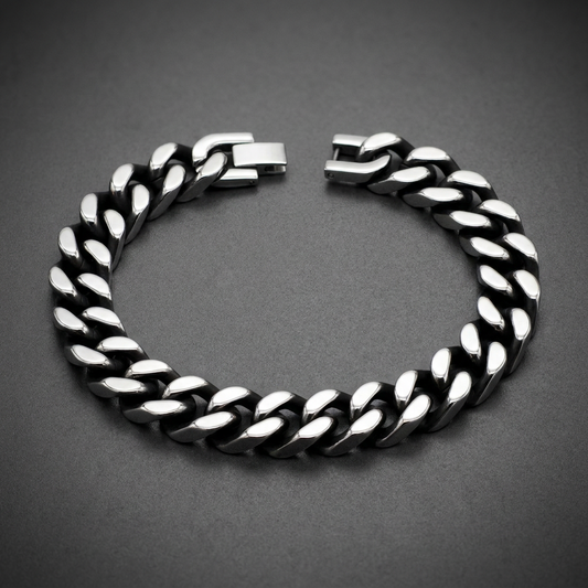Heavy-duty 316L stainless steel curb link bracelet with dark oxidized recesses and bright polished surfaces, featuring a sturdy box clasp.
