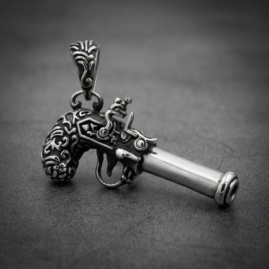 Highly detailed 316L stainless steel pistol pendant with ornate handle detailing and polished barrel.