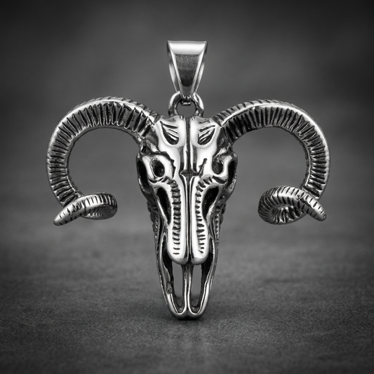 A heavy 316L stainless steel ram skull pendant with detailed curved horns and dark oxidized finish