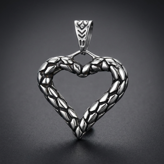 Scale textured heart shaped pendant made from bright 316L surgical stainless steel with an etched bail